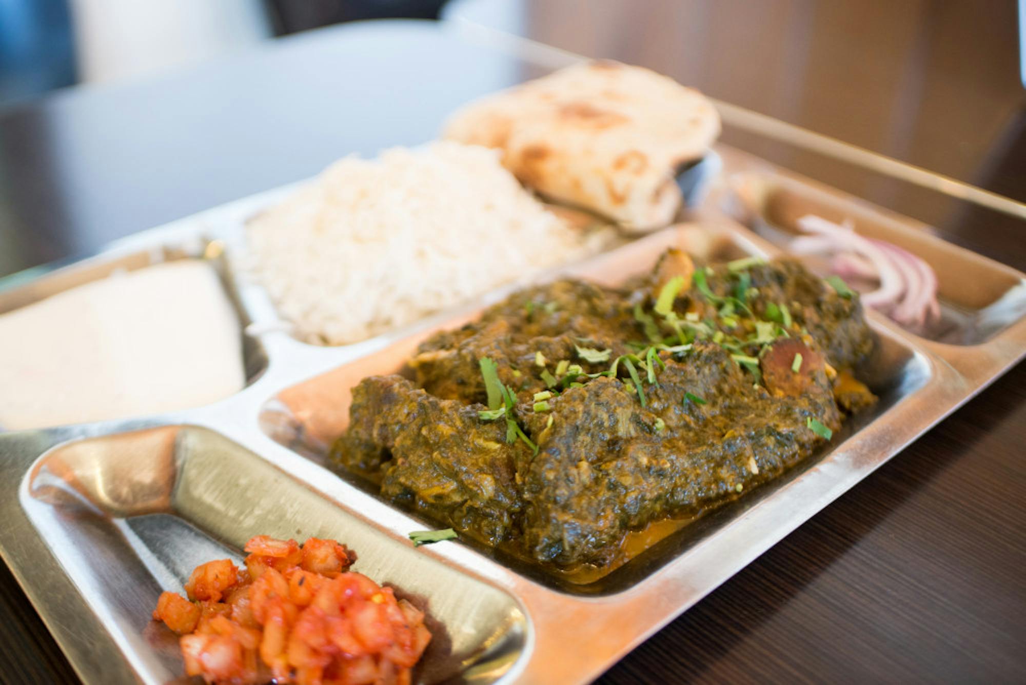 Punjabi Dhaba signature dishes Chicken Tikka MasalaDhaba Special Chicken CurryLamb Saagwala